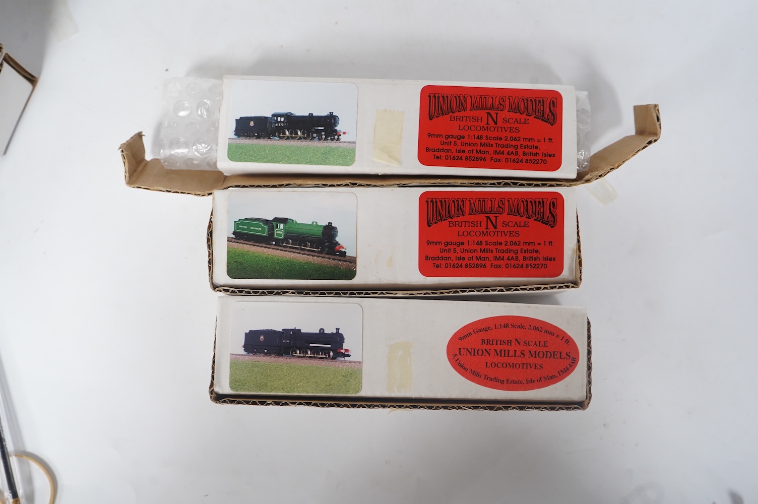 Three boxed Union Mills Models N gauge railway BR locomotives; a Class B12/3, 61572, a Class J39, 64820, and a Class Q2, 63344. Condition - good.